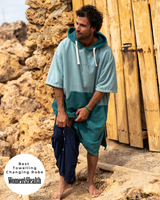 Lead_men - Man wears a Vivida Original Poncho Towel Changing Robe - Turquoise Teal / Pacific Teal