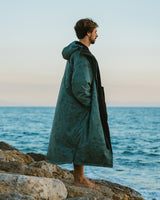 Lead_men - Man wearing a Vivida dry changing robe Green Map of Dreams