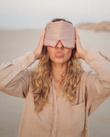 Lead_women2 woman wearing silk sleep eye mask misty rose