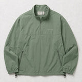 A sage green lightweight windbreaker jacket with a half-zip collar, elastic cuffs, and the brand name 'Vivida' printed on the left chest, laid flat against a light gray background.