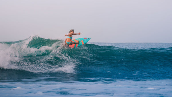 A Woman Surfing - A Guide to Flow State and Surfing