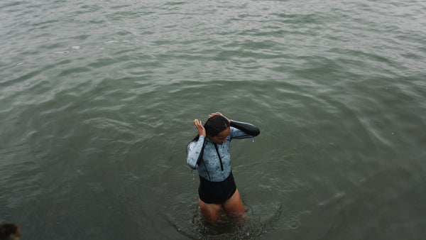 Woman wild swimming in the sea