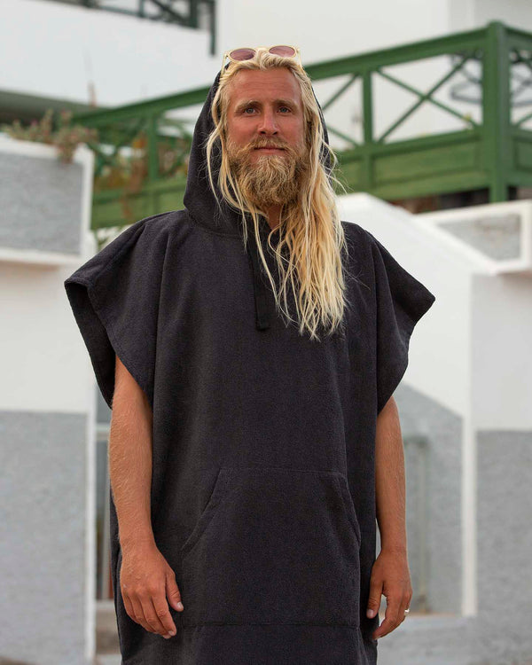 Lead Man wearing a Vivida Essential Poncho Towel Black