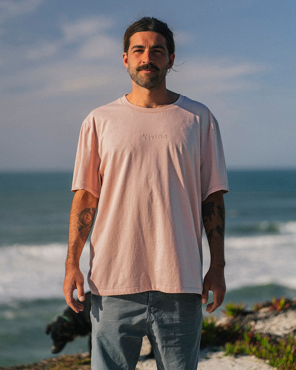 Lead_men - man wearing a Vivida Lifestyle Classic Tee Embroidered T-Shirt misty rose