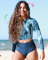 Woman wearing Vivida Women of the Sea High-waisted Bikini Bottom - Indigo