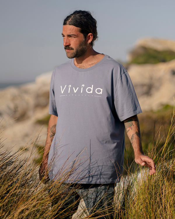 Lead man wearing a Vivida Lifestyle Classic Tee T-Shirt Celestial Blue 