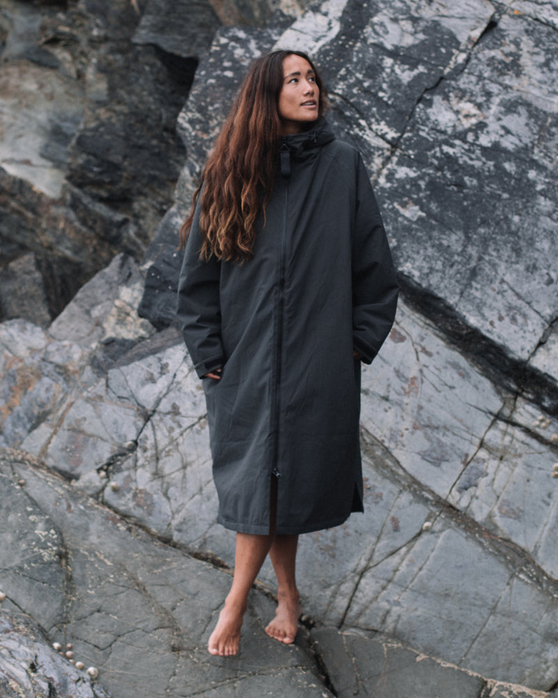 Lead Woman wearing the Vivida All Weather Sherpa Changing Robe - Fossil Grey
