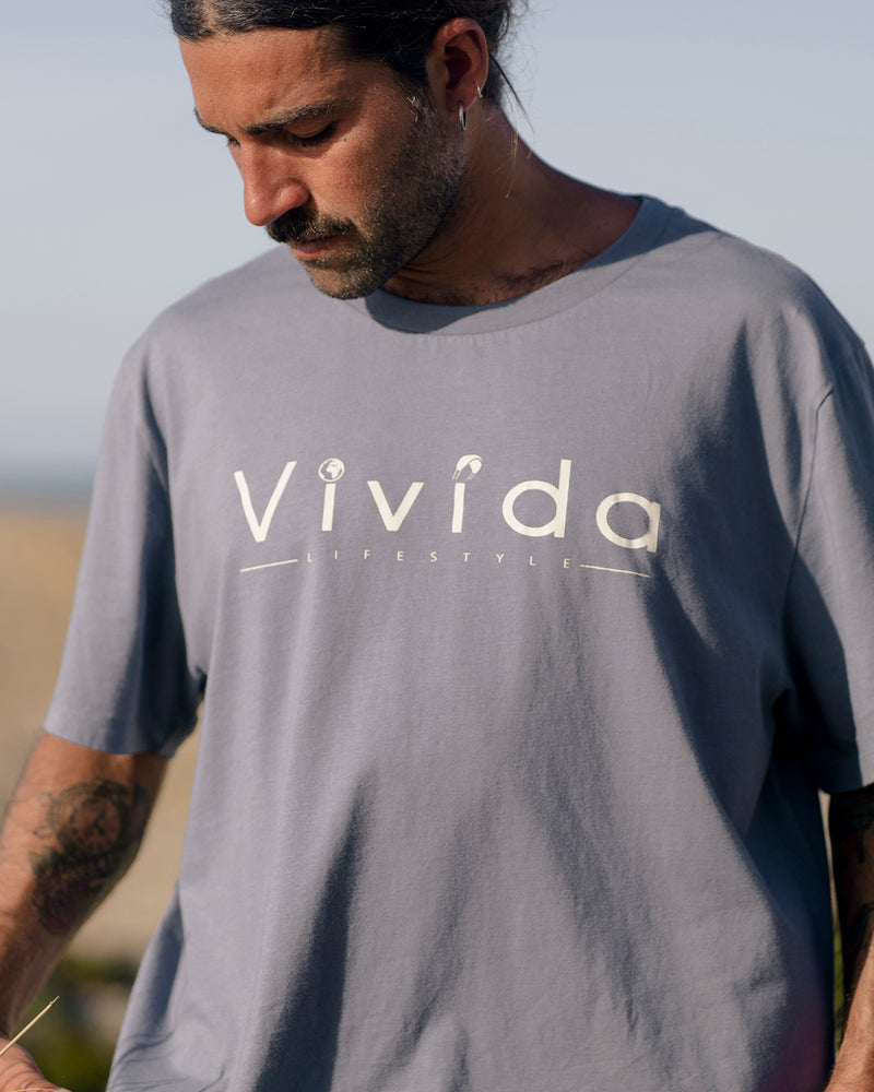 Man wearing a Vivida Lifestyle Classic Tee T-Shirt Celestial Blue 